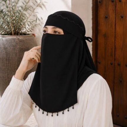 Model wearing a Fancy Saudi niqab with stone Embellishment. BY CLOTHIFYDOTPK