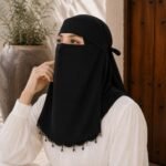 Model wearing a Fancy Saudi niqab with stone Embellishment. BY CLOTHIFYDOTPK