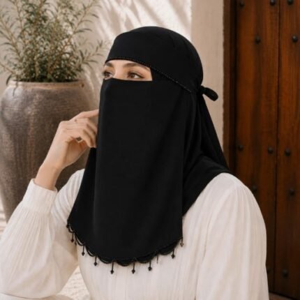 Model wearing a Fancy Saudi niqab with stone Embellishment. BY CLOTHIFYDOTPK