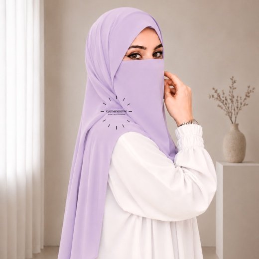 Hijab Niqab Set Tie Back0451 – 24 A woman wearing a complete two piece hijab set with a niqab covering her face, leaving only eyes visible. The set includes an Hijab and separate niqab. By CLOTHIFYDOTPK