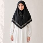 Woman wearing a soft Chiffon Instant Fancy Lace Makhna without sleeves also known as Makhna Hijab or Fancy Scarf. BY CLOTHIFYDOTPK