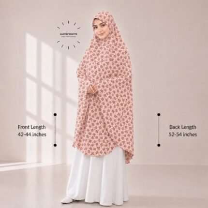 A woman draped in a soft Swiss lawn namaz chadar without sleeves also known as Makhna Hijab or Namaz Scarf with front coverage that falls above the knees, while the back extends down till knees. BY CLOTHIFYDOTPK