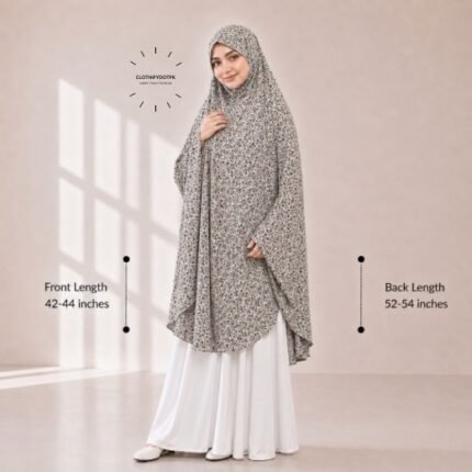A woman draped in a soft Swiss lawn namaz chadar without sleeves with front coverage that falls above the knees, while the back extends down till knees. BY CLOTHIFYDOTPK