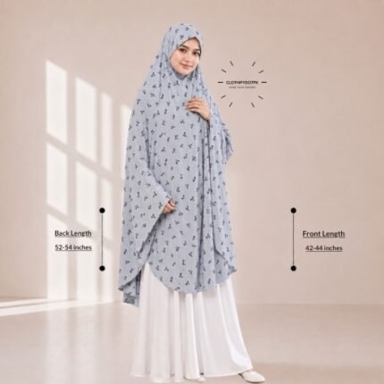 A woman draped in a soft Swiss lawn namaz chadar without sleeves with front coverage that falls above the knees, while the back extends down till knees. BY CLOTHIFYDOTPK