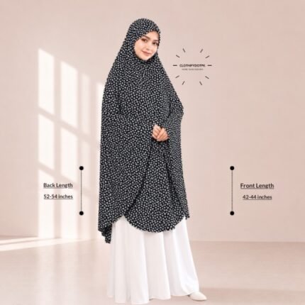 A woman draped in a soft Swiss lawn namaz chadar without sleeves with front coverage that falls above the knees, while the back extends down till knees. BY CLOTHIFYDOTPK