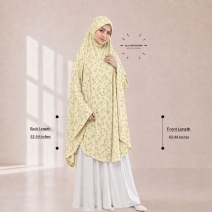 A woman draped in a soft Swiss lawn namaz chadar without sleeves with front coverage that falls above the knees, while the back extends down till knees. BY CLOTHIFYDOTPK