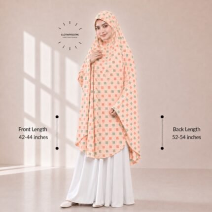 A woman draped in a soft Swiss lawn namaz chadar without sleeves with front coverage that falls above the knees, while the back extends down till knees. BY CLOTHIFYDOTPK