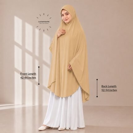 A woman draped in a soft Swiss lawn namaz chadar without sleeves also known as Makhna Hijab, Namaz Makhna or Namaz Scarf with front coverage that falls above the knees, while the back extends down till knees. BY CLOTHIFYDOTPK