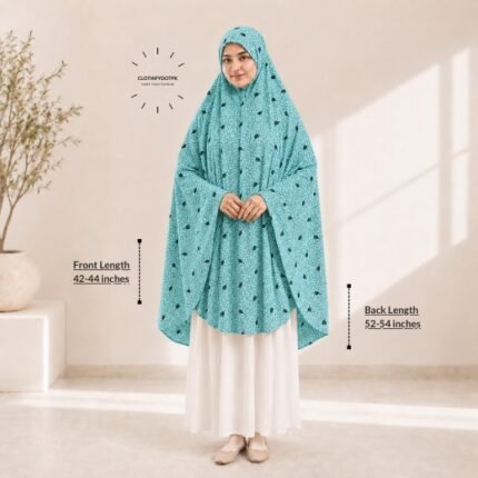 A woman draped in a soft Swiss lawn Makhna Hijab without sleeves with front coverage that falls above the knees, while the back extends down till knees. BY CLOTHIFYDOTPK