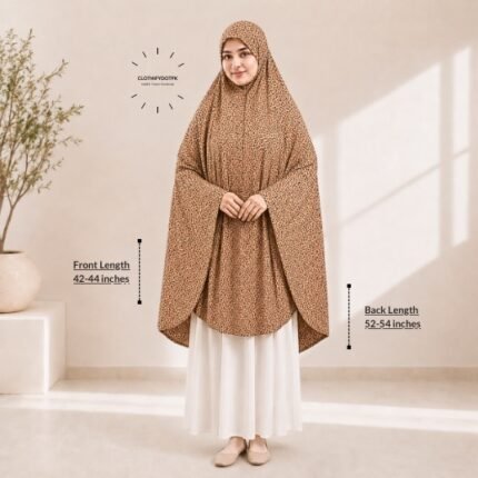 A woman draped in a soft Swiss lawn namaz chadar without sleeves also known as Makhna Hijab, Namaz Makhna or Namaz Scarf with front coverage that falls above the knees, while the back extends down till knees. BY CLOTHIFYDOTPK