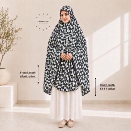 A woman draped in a soft Swiss lawn namaz chadar without sleeves also known as Makhna Hijab or Namaz Scarf with front coverage that falls above the knees, while the back extends down till knees. BY CLOTHIFYDOTPK