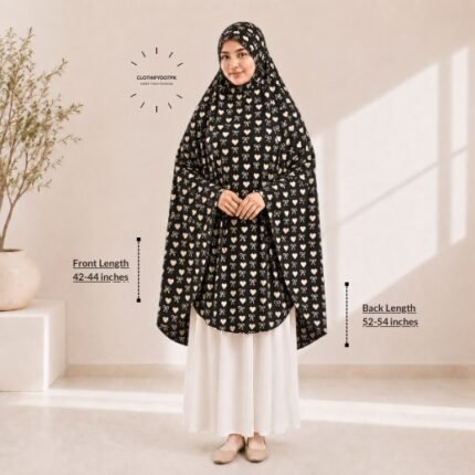 A woman draped in a soft Swiss lawn namaz chadar without sleeves also known as Makhna Hijab or Namaz Scarf with front coverage that falls above the knees, while the back extends down till knees. BY CLOTHIFYDOTPK