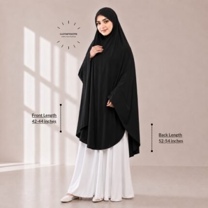 A woman draped in a soft Swiss lawn namaz chadar without sleeves also known as Makhna Hijab, Namaz Makhna or Namaz Scarf with front coverage that falls above the knees, while the back extends down till knees. BY CLOTHIFYDOTPK