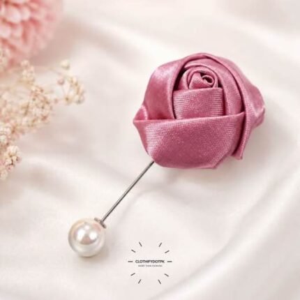 Hand-stitched flower shape brooch with layered petals and a pin clasp.