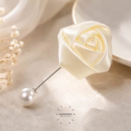 Hand-stitched flower shape brooch with layered petals and a pin clasp.