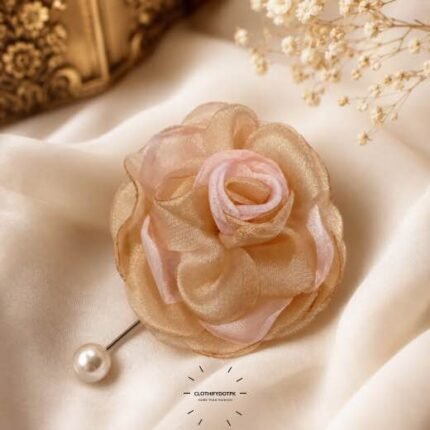 Hand-stitched flower shape brooch with layered petals and a pearl pin clasp.