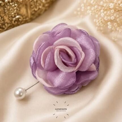 Hand-stitched flower shape brooch with layered petals and a pearl pin clasp.