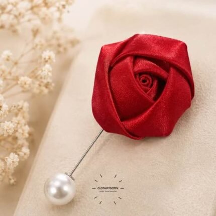 Hand-stitched flower shape brooch with layered petals and a pin clasp.