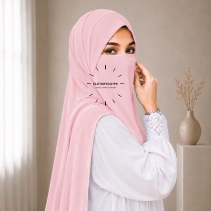 A woman wearing a complete 2 piece hijab set with a niqab covering her face, leaving only eyes visible. The set includes an Hijab and separate niqab. By CLOTHIFYDOTPK