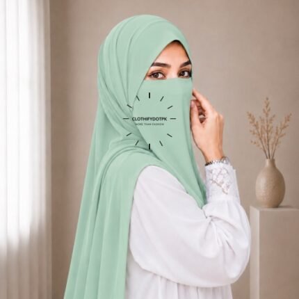 A woman wearing a complete 2 piece hijab set with a niqab covering her face, leaving only eyes visible. The set includes an Hijab and separate niqab. By CLOTHIFYDOTPK