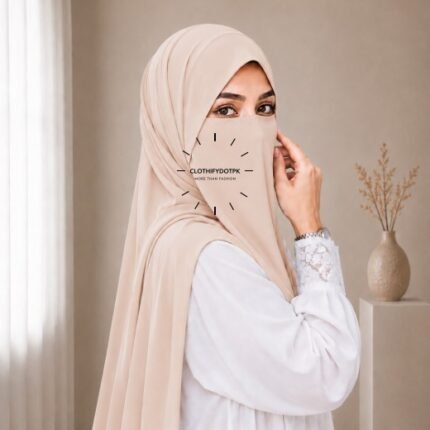 A woman wearing a complete two piece hijab set with a niqab covering her face, leaving only eyes visible. The set includes an Hijab and separate niqab. By CLOTHIFYDOTPK