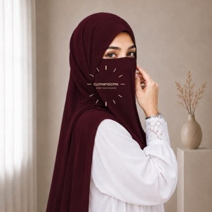 A woman wearing a complete 2 piece hijab set with a niqab covering her face, leaving only eyes visible. The set includes an Hijab and separate niqab. By CLOTHIFYDOTPK