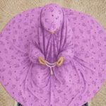 Young girl wearing a soft, breathable kids namaz chadar with comfortable sleeves, ideal for children offering namaz. BY CLOTHIFYDOTPK