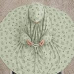 Young girl wearing a soft, breathable kids namaz chadar with comfortable sleeves, ideal for children offering namaz. BY CLOTHIFYDOTPK