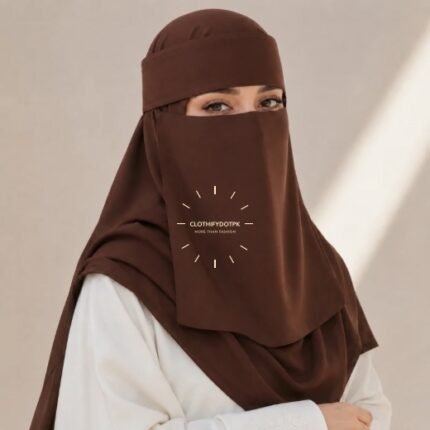 A woman wearing a complete 2 piece Saudi Niqab and Hijab set. By CLOTHIFYDOTPK