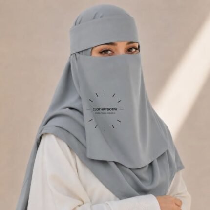 A woman wearing a complete 2 piece Saudi Niqab and Hijab set. By CLOTHIFYDOTPK