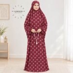 Woman standing wearing printed arabic namaz chadar holding prayer beads full coverage and comfort without compromising style. BY CLOTHIFYDOTPK