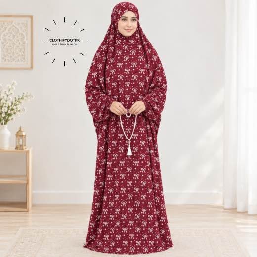 Arabic Namaz chadar - 11 Woman standing wearing printed arabic namaz chadar holding prayer beads full coverage and comfort without compromising style. BY CLOTHIFYDOTPK