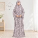 Woman standing wearing printed arabic namaz chadar holding prayer beads full coverage and comfort without compromising style. BY CLOTHIFYDOTPK