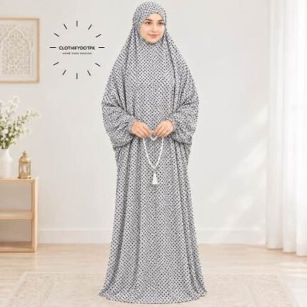 Woman standing wearing printed arabic namaz chadar holding prayer beads full coverage and comfort without compromising style. BY CLOTHIFYDOTPK