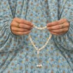 Woman wearing printed arabic namaz chadar holding prayer beads full coverage and comfort without compromising style. BY CLOTHIFYDOTPK