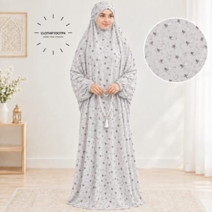Woman standing wearing printed arabic namaz chadar holding prayer beads full coverage and comfort without compromising style. BY CLOTHIFYDOTPK