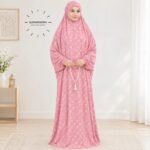 Woman standing wearing printed arabic namaz chadar holding prayer beads full coverage and comfort without compromising style. BY CLOTHIFYDOTPK
