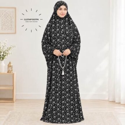 Woman standing wearing printed arabic namaz chadar holding prayer beads full coverage and comfort without compromising style. BY CLOTHIFYDOTPK