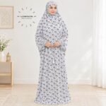 Woman standing wearing printed arabic namaz chadar holding prayer beads full coverage and comfort without compromising style. BY CLOTHIFYDOTPK