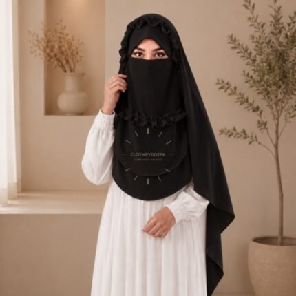 A woman wearing a soft, Chiffon instant Crown hijab with Niqab, draped smoothly around her head and shoulders with no visible pins. BY CLOTHIFYDOTPK