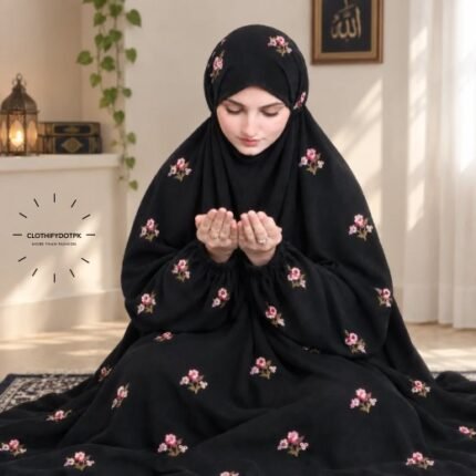 Woman wearing floral embroidered namaz chadar with sleeves for modest Islamic prayerwear. BY CLOTHIFYDOTPK