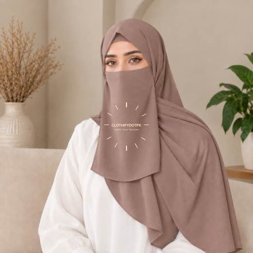 A woman wearing a complete 3 piece hijab set with a niqab covering her face, leaving only eyes visible. The set includes an underscarf, outer scarf and separate niqab. By CLOTHIFYDOTPK