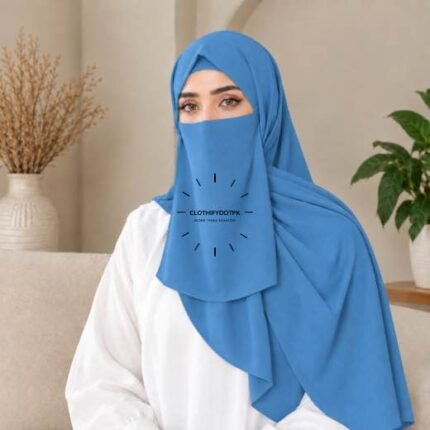 A woman wearing a complete 3 piece hijab set with a niqab covering her face, leaving only eyes visible. The set includes an underscarf, outer scarf and separate niqab. By CLOTHIFYDOTPK
