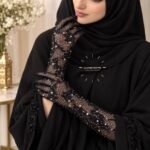 A pair of fancy, imported net gloves featuring a detailed rhinestones with mesh pattern. BY CLOTHIFYDOTPK