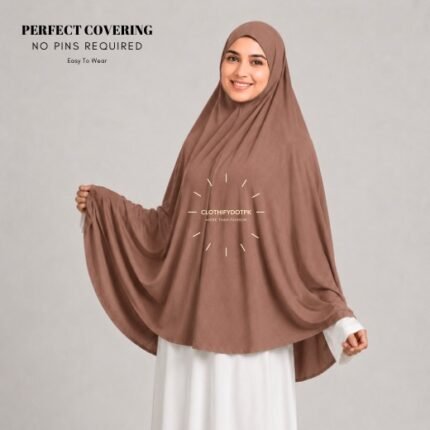 A woman wearing a Bronze jersey Hajj and Umrah scarf – a Namaz Makhna hijab designed for head, neck and shoulder coverage without the need for pins. By CLOTHIFYDOTPK
