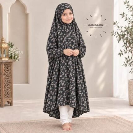 A young girl wearing a soft, lightweight kids namaz chadar with sleeves made of breathable fabric, sized perfectly for a child offering salah. BY CLOTHIFYDOTPK