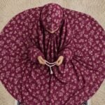 A young girl wearing a soft, lightweight kids namaz chadar with sleeves made of breathable fabric, sized perfectly for a child offering salah. BY CLOTHIFYDOTPK