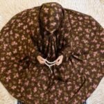 Young girl wearing a soft, breathable kids namaz chadar with comfortable sleeves, ideal for children offering namaz. BY CLOTHIFYDOTPK