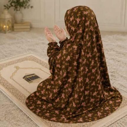 Young girl wearing a soft, breathable kids namaz chadar with comfortable sleeves, ideal for children offering namaz. BY CLOTHIFYDOTPK