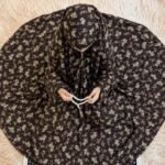 Young girl wearing a soft, breathable kids namaz chadar with comfortable sleeves, ideal for children offering namaz. BY CLOTHIFYDOTPK